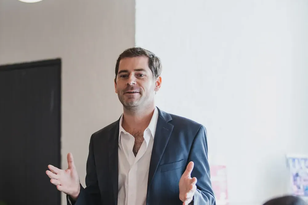 Sébastien presenting to guests at a roundtable in the Jacob Jensen Design studio in Bangkok.